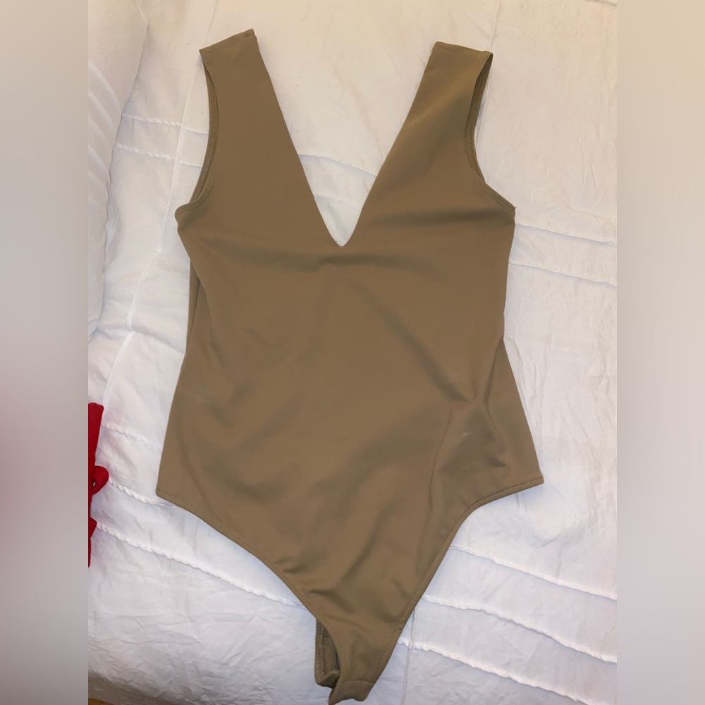 Never worn free people body suit
